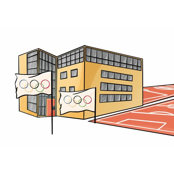 Modernes Gebäude mit Fensterfront und Olympiagrafiken auf Fahnen vor einem Sportplatz mit rotem Belag.