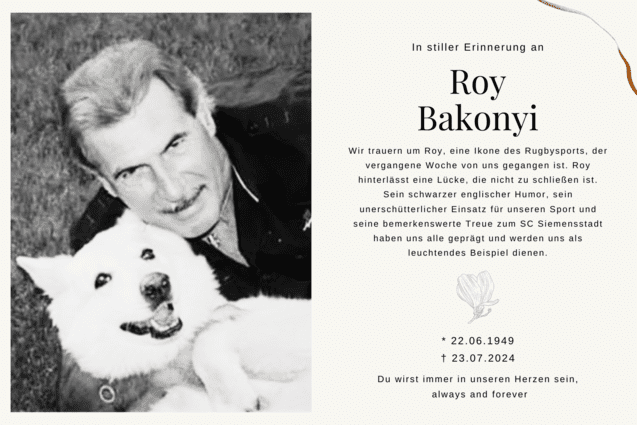 Porträt eines Mannes mit grauem Haar, der lächelnd einen weißen Hund auf dem Schoß hält. Erinnerungsanzeige für Roy Bakonyi.