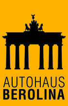 Silhouette des Brandenburger Tors vor gelber Hintergrundfarbe mit der Schriftzug „Autohaus Berolina“ darunter.