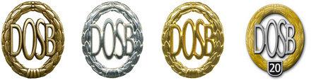 Vier Medaillen in verschiedenen Ausführungen (Gold, Silber, Bronze und eine spezielle 20-Jahre-Medaille) mit dem Schriftzug "DOSB".